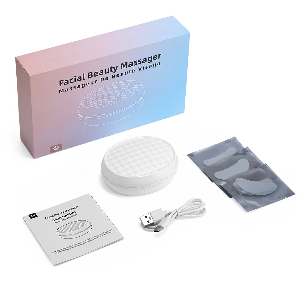 Facial beauty massager kit with device, USB cable, gel pads, manual, and packaging