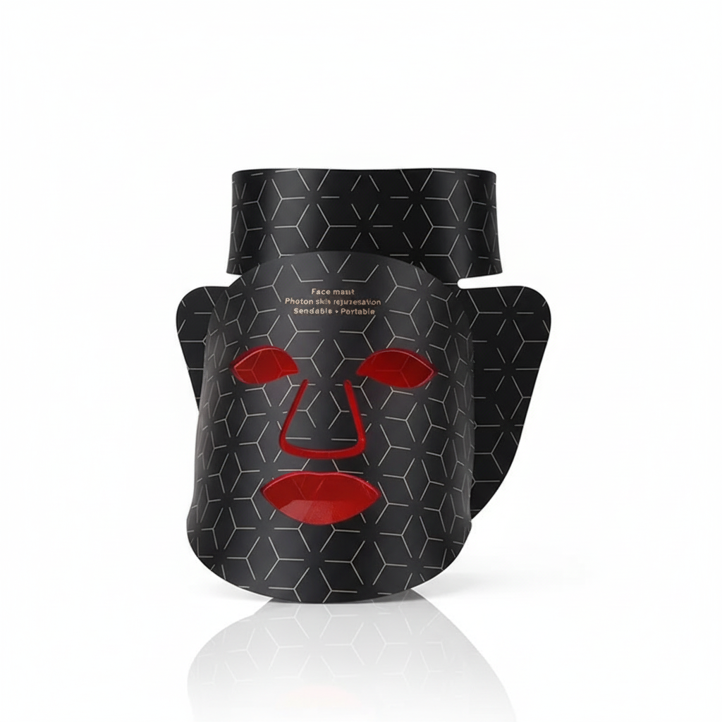 Black geometric LED face mask for skin rejuvenation with red cutouts, on white background.